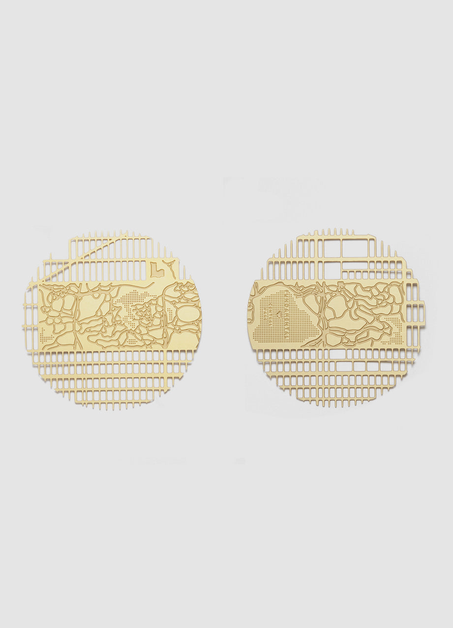 Manhattan 2 Coasters, a pair of brass coasters cut with the Manhattan grid