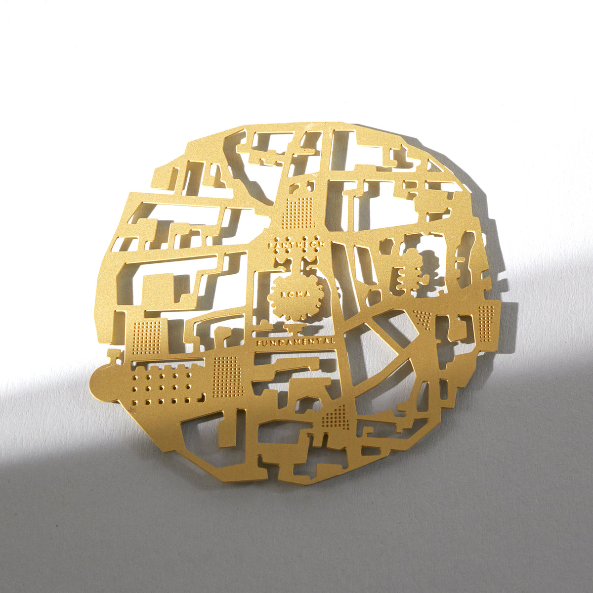 Close-up of a Roma coaster showing the streets around the Colosseum